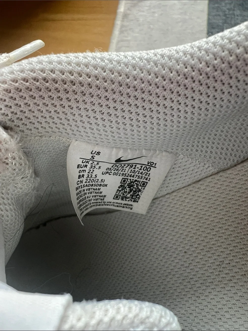 Nike sneakers with leopard print swoosh